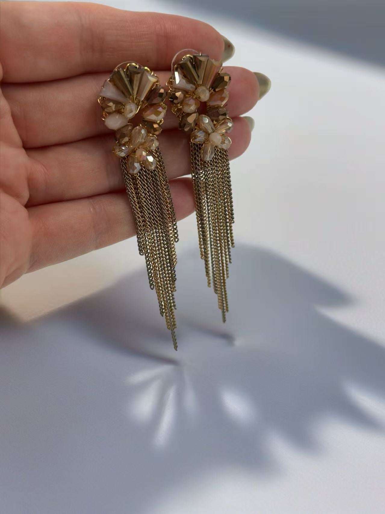 Elegant Gold and Crystal Flower Earrings with Cascading Tassels