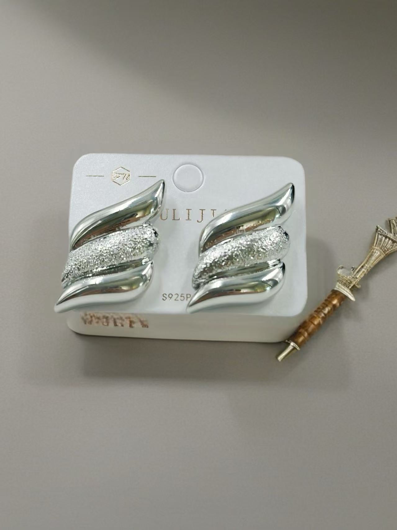 Sculpted Silver-Tone Wave Stud Earrings