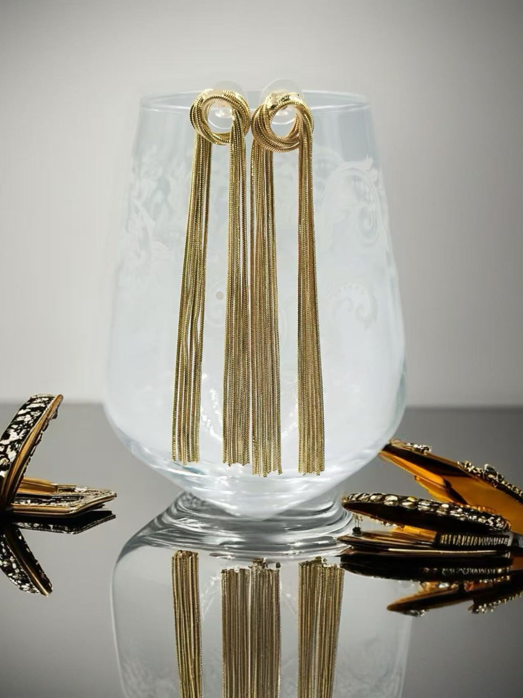 Gold Knot Tassel Statement Earrings