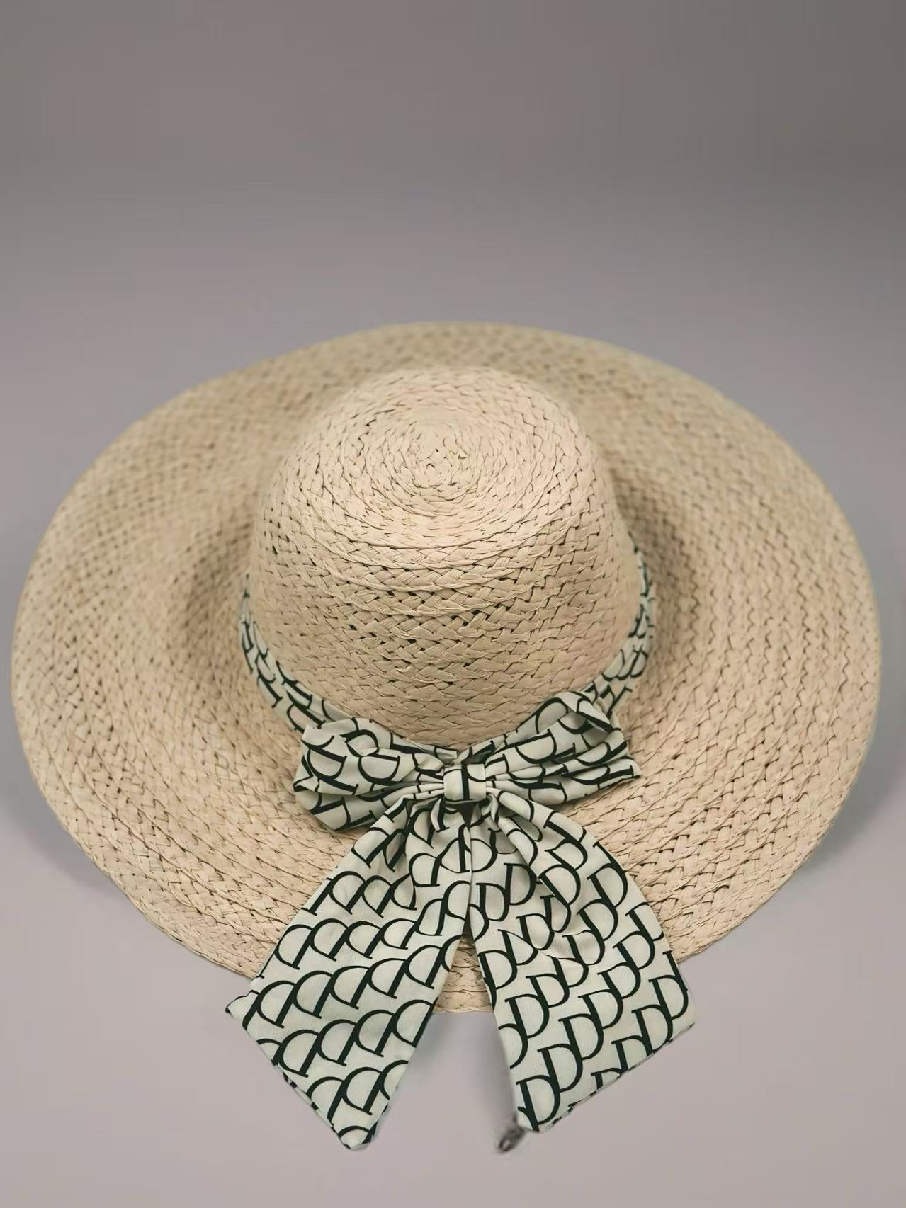 Beige Woven Straw Hat with Patterned Bow