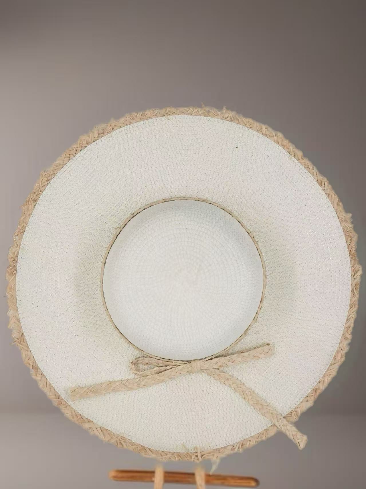 Ivory Wide-Brim Hat with Braided Straw Bow and Fringed Edge