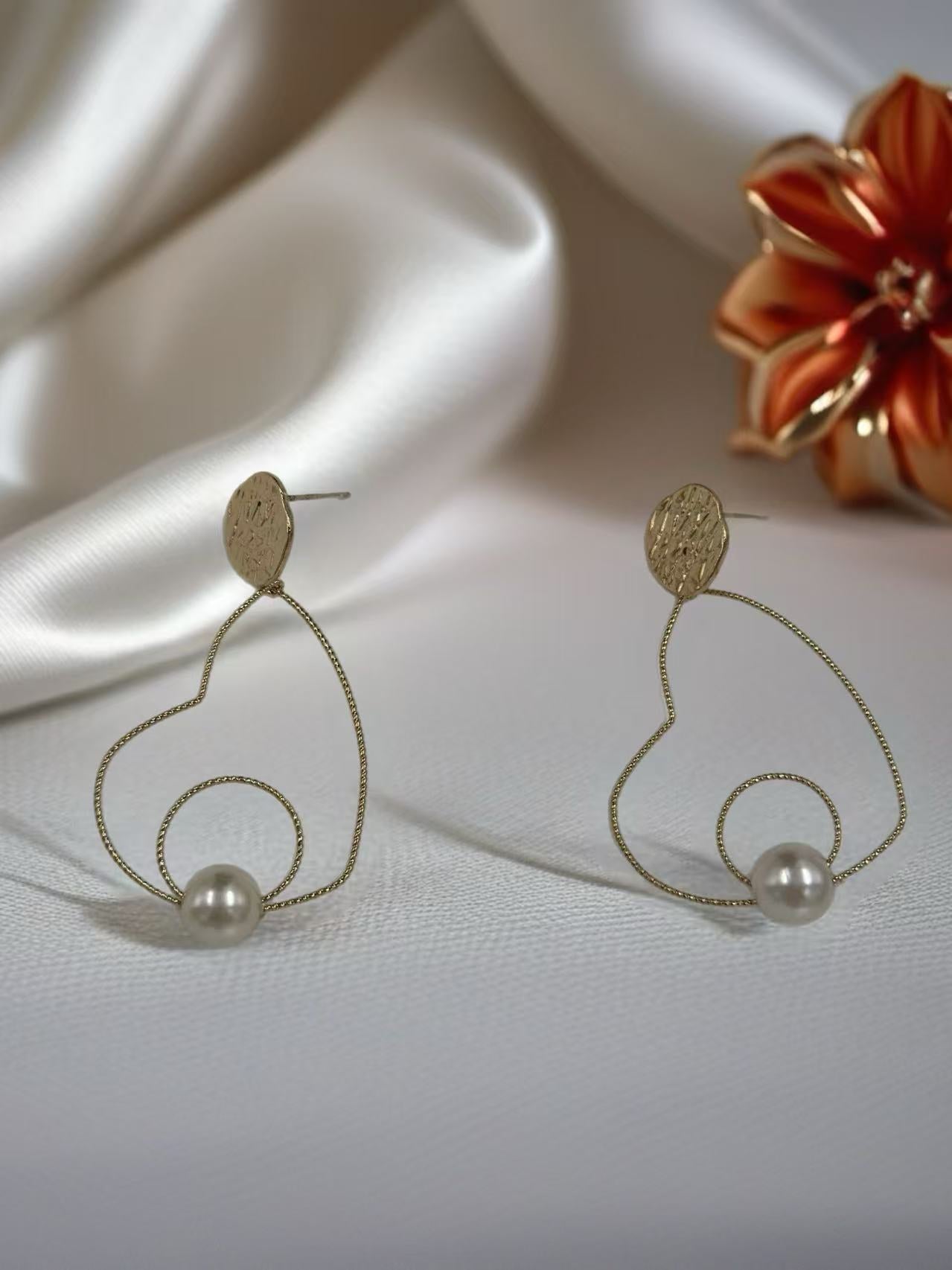 Elegant Heart-Shaped Wire Earrings with Pearl Accents