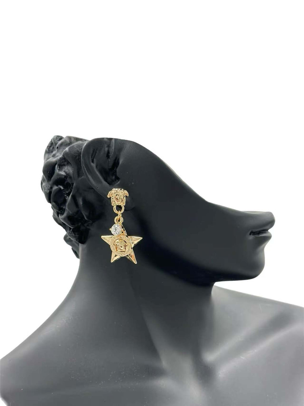 Bold Star Drop Earrings with Crystal and Medusa Motif