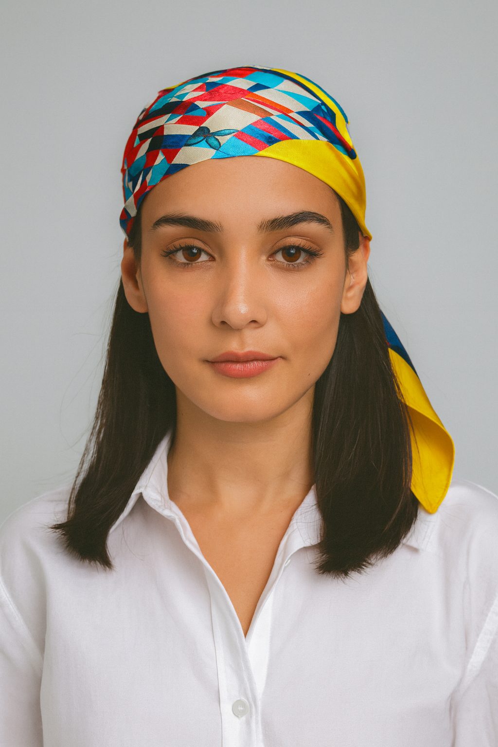 Vibrant Geometric Patchwork Scarf with Yellow Border